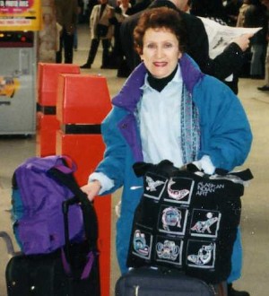 Traveler with carry-ons